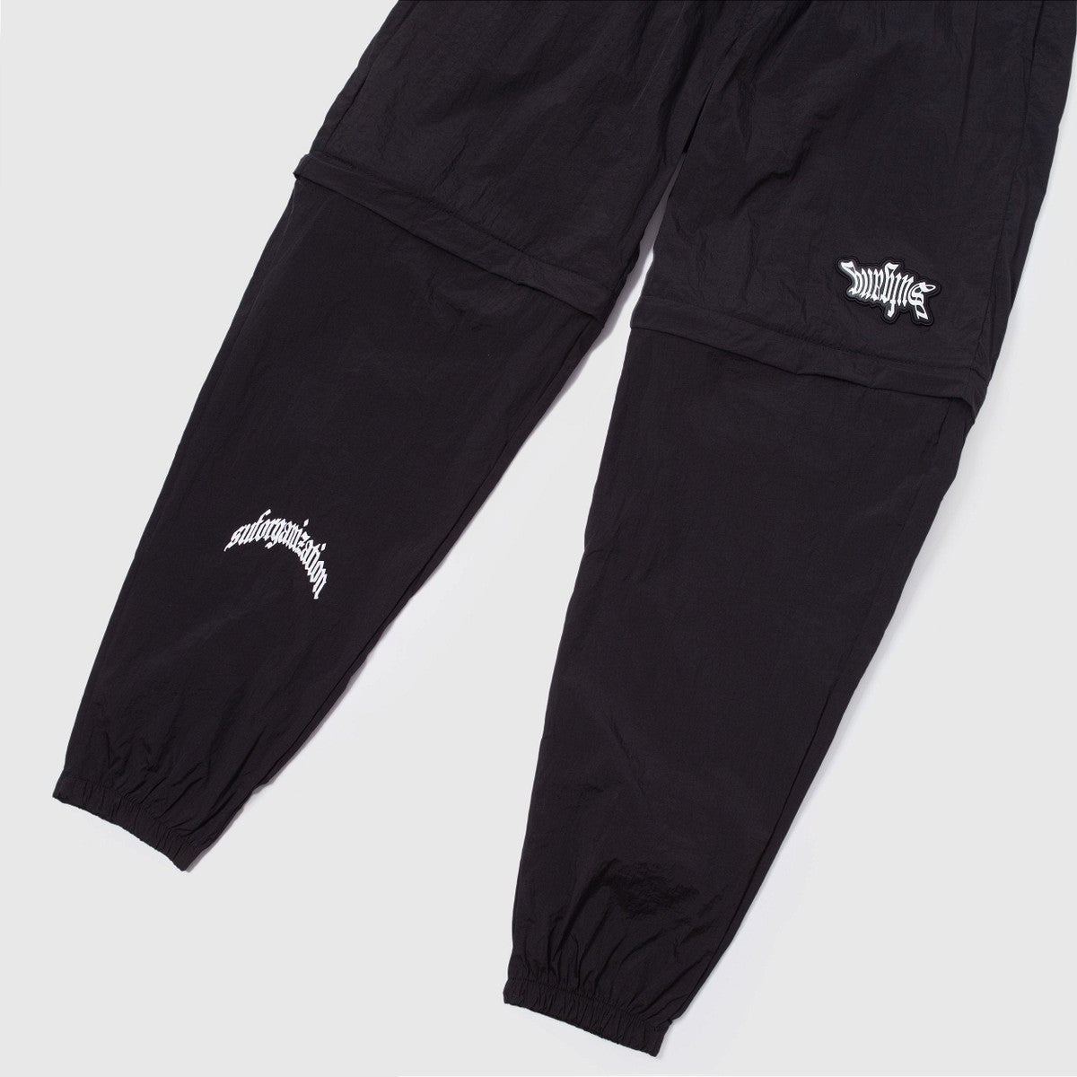 Calça TrackSuit Convertible Glow In The Dark Preta